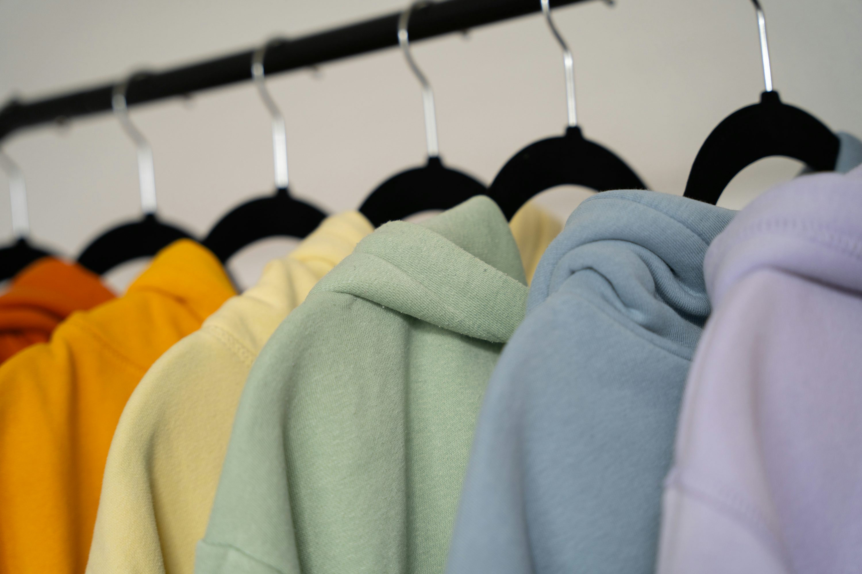 Illustrative rack of hooded sweatshirts